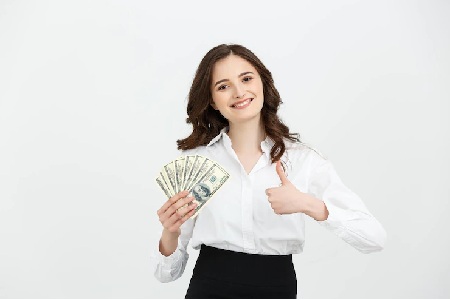 women holding dollars